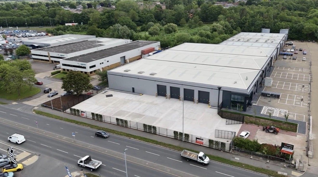 Completed aerial view of the Harlow industrial building and concrete forecourt