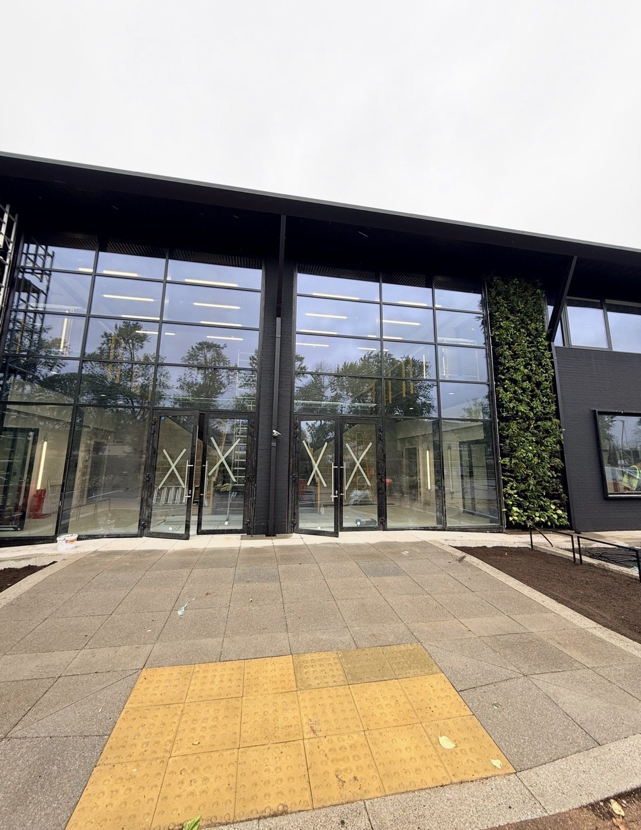 Completed entrance paving and landscaping at Heathrow West
