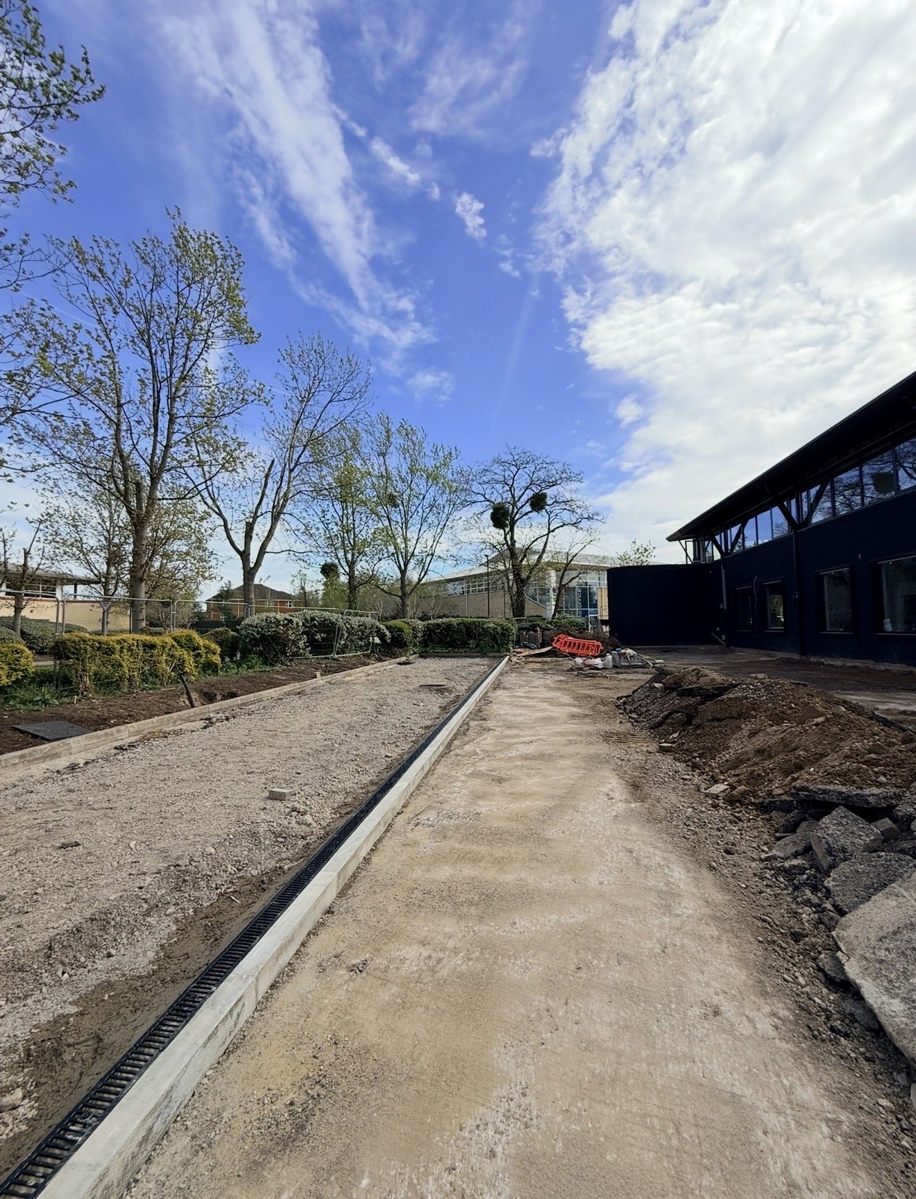 Drainage channel and kerbing installation at Heathrow West