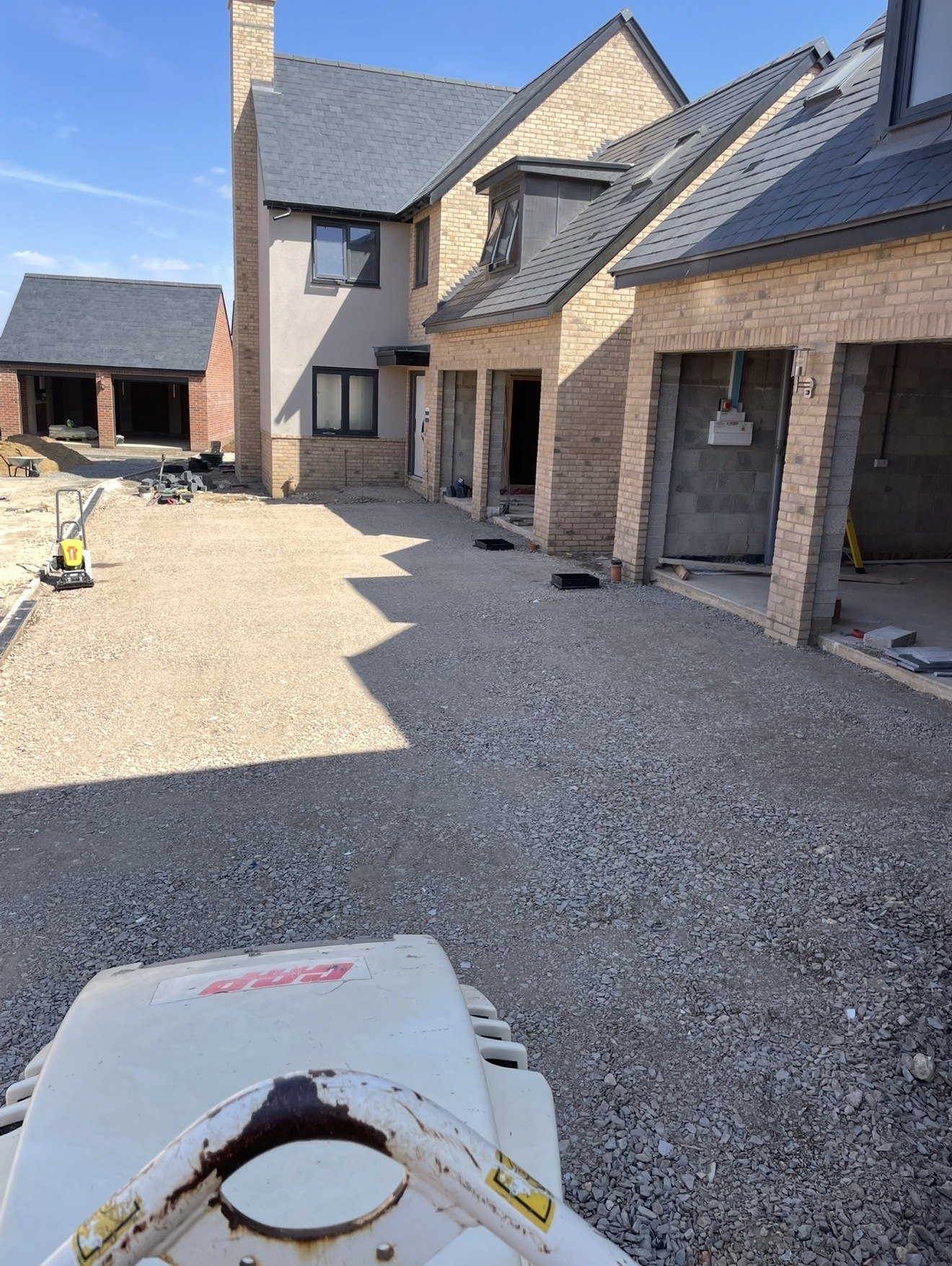 Compacted driveway base before block paving at Kettering